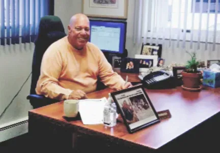 Warren H. Gruberger at his desk
